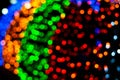 Defocused blurred glowing christmas festive multicolored lights