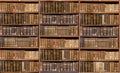 Defocused shelves of old antique books for background