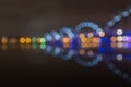 Defocused blurred lights of the Railway bridge in Riga at night Royalty Free Stock Photo