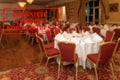 Defocused view of interior of an upmarket wedding venue empty and closed with Polish notice Closed due to Coronavirus Royalty Free Stock Photo