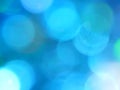 Defocused bokeh circle green and blue night lights background texture. Royalty Free Stock Photo