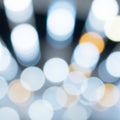 Defocused bokeh lights create an abstract, blurred image with circular patterns. Dominated by cool Royalty Free Stock Photo