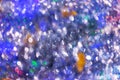 Defocused brilliant Christmas background. New Year`s background with bokeh