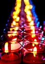 Defocused burning candles in black