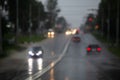 defocused cars on road at summer heavy rain Royalty Free Stock Photo