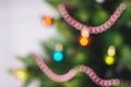 Defocused christmas background. Christimas tree, decoration and lights