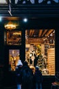 Defocused Christmas Scene street store toy silhouettes