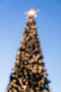 Defocused christmas tree with blurred lights Royalty Free Stock Photo