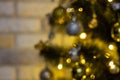 Defocused Christmas tree garland illumination. Blurred sparkling fairy background. Silver and gold lights, bokeh effect Royalty Free Stock Photo