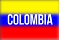 Defocused colombian flag with the word colombia