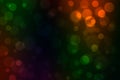 Defocused Colored Lights Over Dark Background