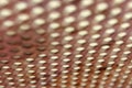 defocused, Gold colour steel meshwork