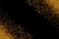 Defocused gold glitter with glowing sparks lights on a black background. Holiday greeting card Royalty Free Stock Photo