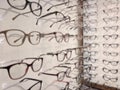 Large group of optical eyeglasses and eyewear.on disply on a wall Royalty Free Stock Photo