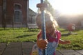 Defocused image of Little girl climbs on rope in the playground. Childhood concept. Growth concept