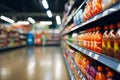 Defocused interior of a supermarket aisle with product shelves in view Royalty Free Stock Photo