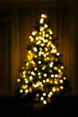 Christmas tree bokeh, blurred glittering lights, festive holiday background