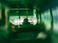 Defocused lights background view from inside bus with passengers Royalty Free Stock Photo