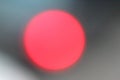 Defocused lights, red lens flare. Abstract blured background