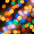 Defocused multicolored lights create a bokeh effect, producing circular patterns in Royalty Free Stock Photo