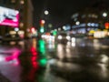 defocused night rain city street cross roads view