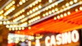 Defocused old fasioned electric lamps glowing at night. Abstract close up of blurred retro casino decoration shimmering, Las Vegas Royalty Free Stock Photo