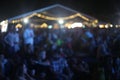 Defocused people at open air music festival