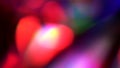 Blurred round multicolor shapes randomly moving.