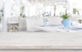 Defocused resort restaurant background with wooden table top in front Royalty Free Stock Photo