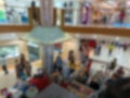 Defocused Shopping mall background with bokeh shoot from 2nd Floor. Blur Shopping mall background