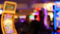 Defocused slot machines glow in casino on fabulous Las Vegas Strip, USA. Blurred gambling jackpot slots in hotel near Fremont