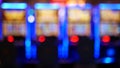 Defocused slot machines glow in casino on fabulous Las Vegas Strip, USA. Blurred gambling jackpot slots in hotel near Fremont