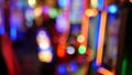 Defocused slot machines glow in casino on fabulous Las Vegas Strip, USA. Blurred gambling jackpot slots in hotel near Fremont