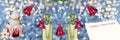 Defocused widescreen Christmas background, with greetings and a toy snowman. Art design, banner