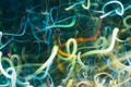 Defocused yellow blue swirly lines colored smoke Royalty Free Stock Photo