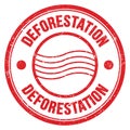 DEFORESTATION text written on red round postal stamp sign