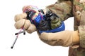 defused improvised explosive device (IED) in hand