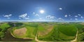 360-degree panoramic aerial view from drone. Clear skies with the sun