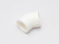 45 degrees PPR plastic pipe eking, jointing piece. Royalty Free Stock Photo