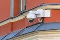 360 degrees security surveillance camera. Camcorder on a house corner. Modern videcam