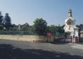 Dehradun, India: Wide angle view of Statue of Lord Buddha monastery Temple with golden stupa on top, located