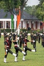 IMA passing out parade cadets marching with flags.