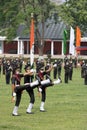 IMA passing out parade cadets marching with flags.