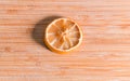 Dehydrated food. Top view of a slice of a dried lemon