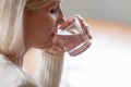 Dehydrated healthy senior woman feeling thirsty drinking water, Royalty Free Stock Photo