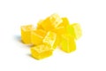 Dehydrated mango dices isolated on white background. Dried mango cubes. Heap of candied diced fruits, Wholesome Snack
