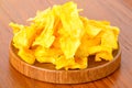 Dehydrated mango on wooden platter