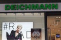 Deichmann logo and Rita Ora on Deichmann store