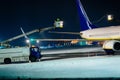 Deicing passenger airplane during heavy snow Royalty Free Stock Photo
