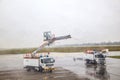 Deicing truck deices a plane before